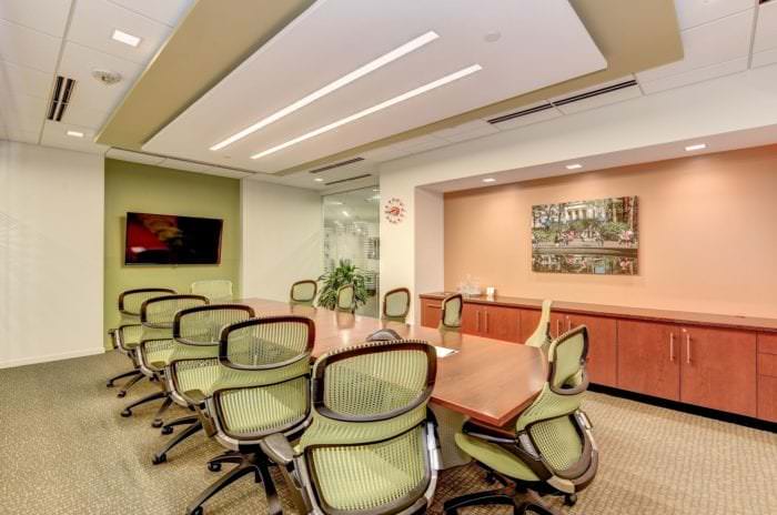 Medium size conference room with pretty lime colored chairs