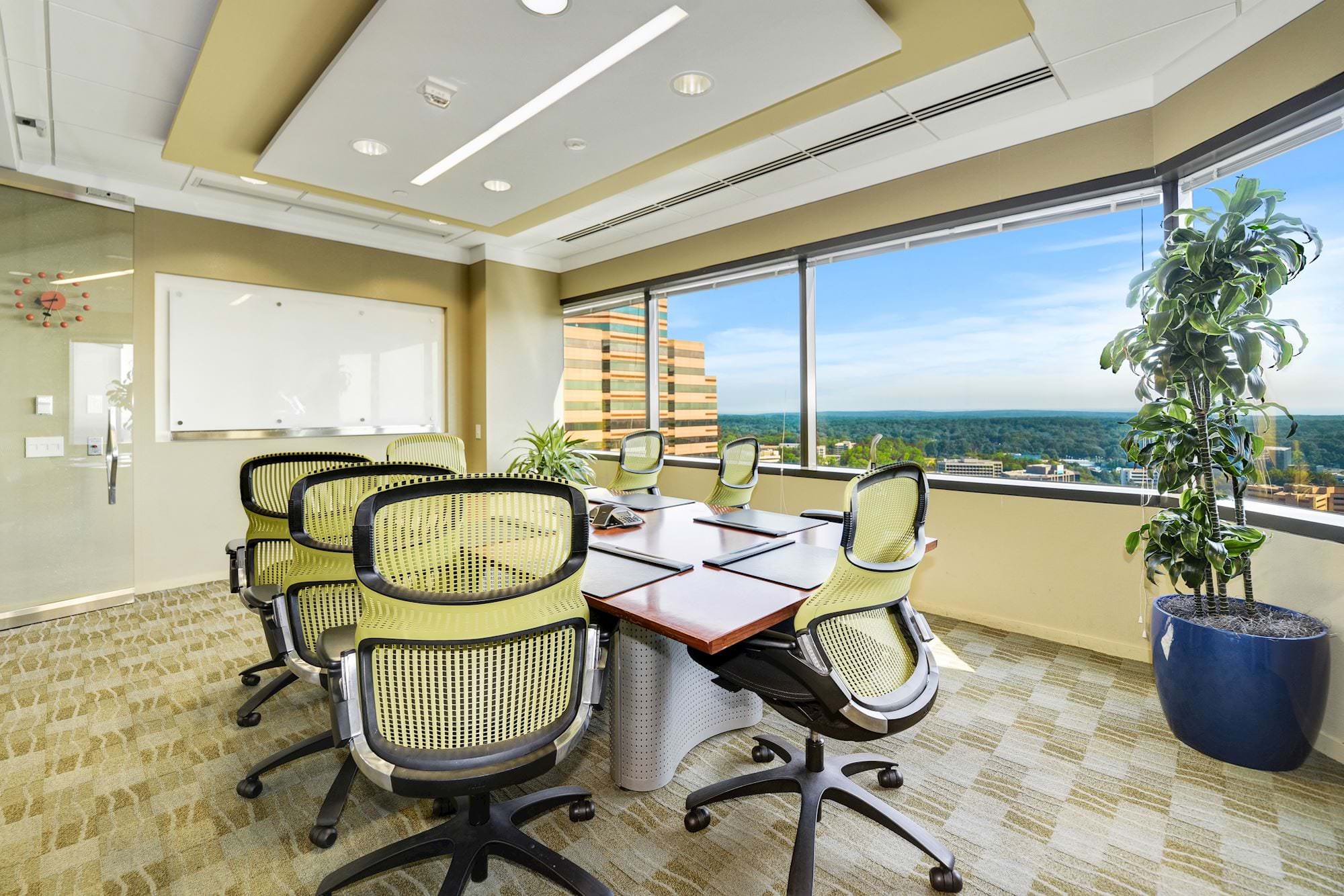Small meeting room with a large window view of beautiful McLean, Virginia
