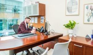 A lawyer working from an attorney coworking space.