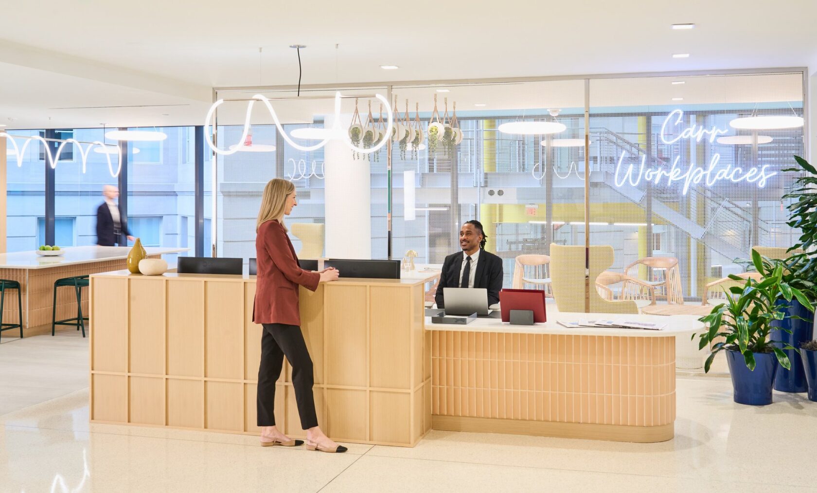 A member being greeted at the Carr Workplaces Capitol Hill reception desk