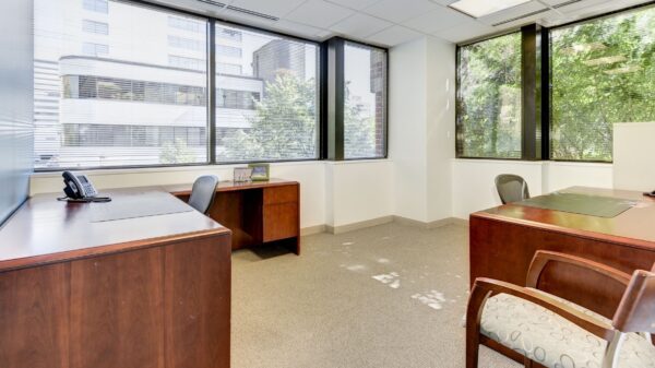 Windowed private office with two desks at Carr Workplaces Bethesda