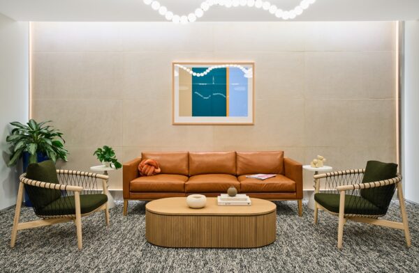 Lobby lounge seating area at Carr Workplaces Capitol Hill
