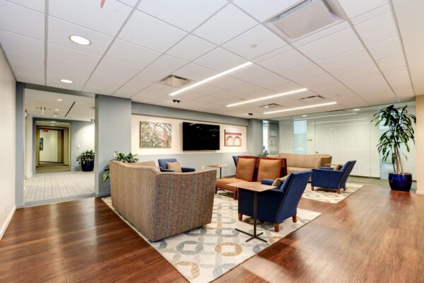 Lounge and cafe seating area at Carr Workplaces Penn Ave in Washington, D.C.