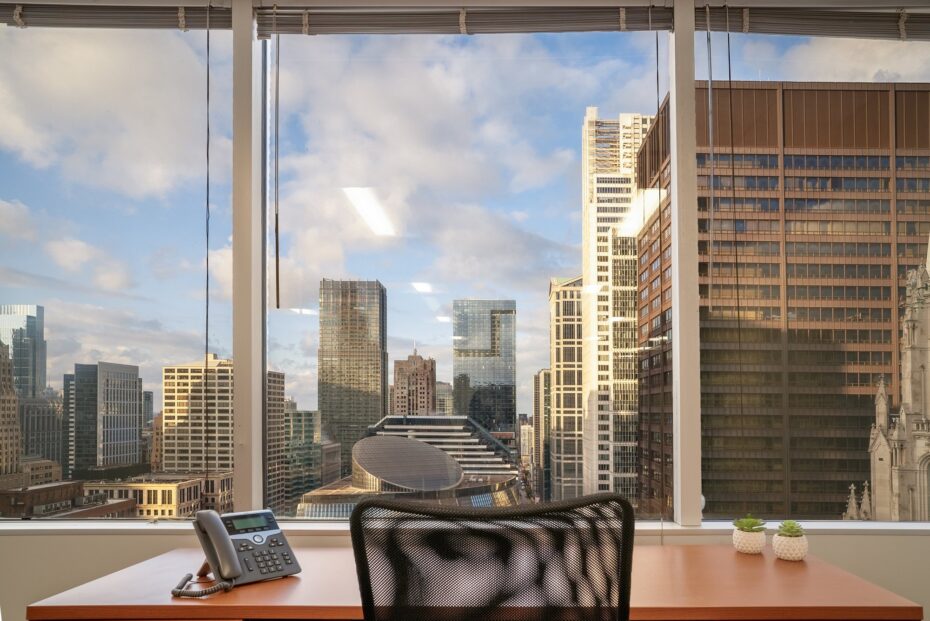 Private office with Chicago skyline view at Carr Workplaces The Loop
