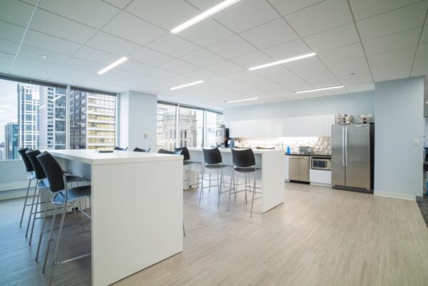 Social hub and cafe with downtown Chicago views at Carr Workplaces The Loop